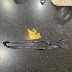 Louis Vuitton Navy Ribbon with Gold Tag